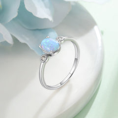 Oval Blue Opal with Two Small Zircon Sterling Silver Ring