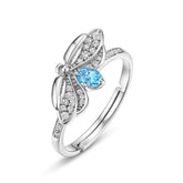 Oval Blue Topaz Zircon Glowworm Opening Sterling Silver Ring