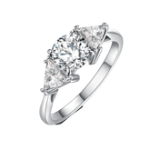 Round and Triangle Moissanite Three Stone Engagement Ring