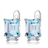 Emerald Cut Natural Blue Topaz Stud Earrings