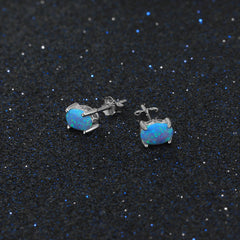 Four Prongs 6mm Blue Oval Opal Sterling Silver Stud Earrings