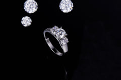 Round and Oval Moissanite Three Stone Engagement Ring