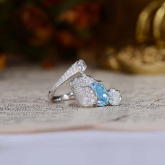 Oval Natural Blue Topaz Waves Ring