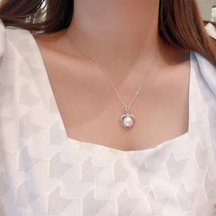 Hollow Heart with Round Pearl Pendant Silver Necklace for Women