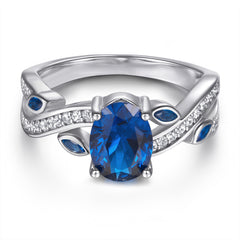 Blue Oval Zircon with Hollow Pattern Silver Ring for Women