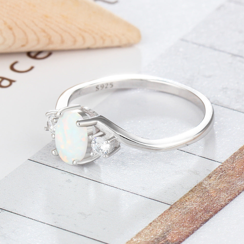 Oval Opal with Two Small Zircon Embrace Arm Sterling Silver Ring