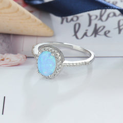 Cathedral Oval Blue Opal Zircon Soleste Halo Sterling Silver Ring