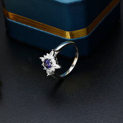 Round Cut Blue Zircon Flower Halo Silver Ring
