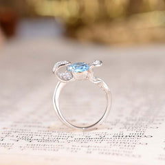 Oval Natural Blue Topaz Waves Ring