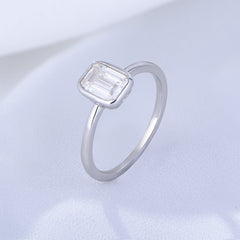 White Zircon Emerald Shape Solitaire Sterling Silver Ring