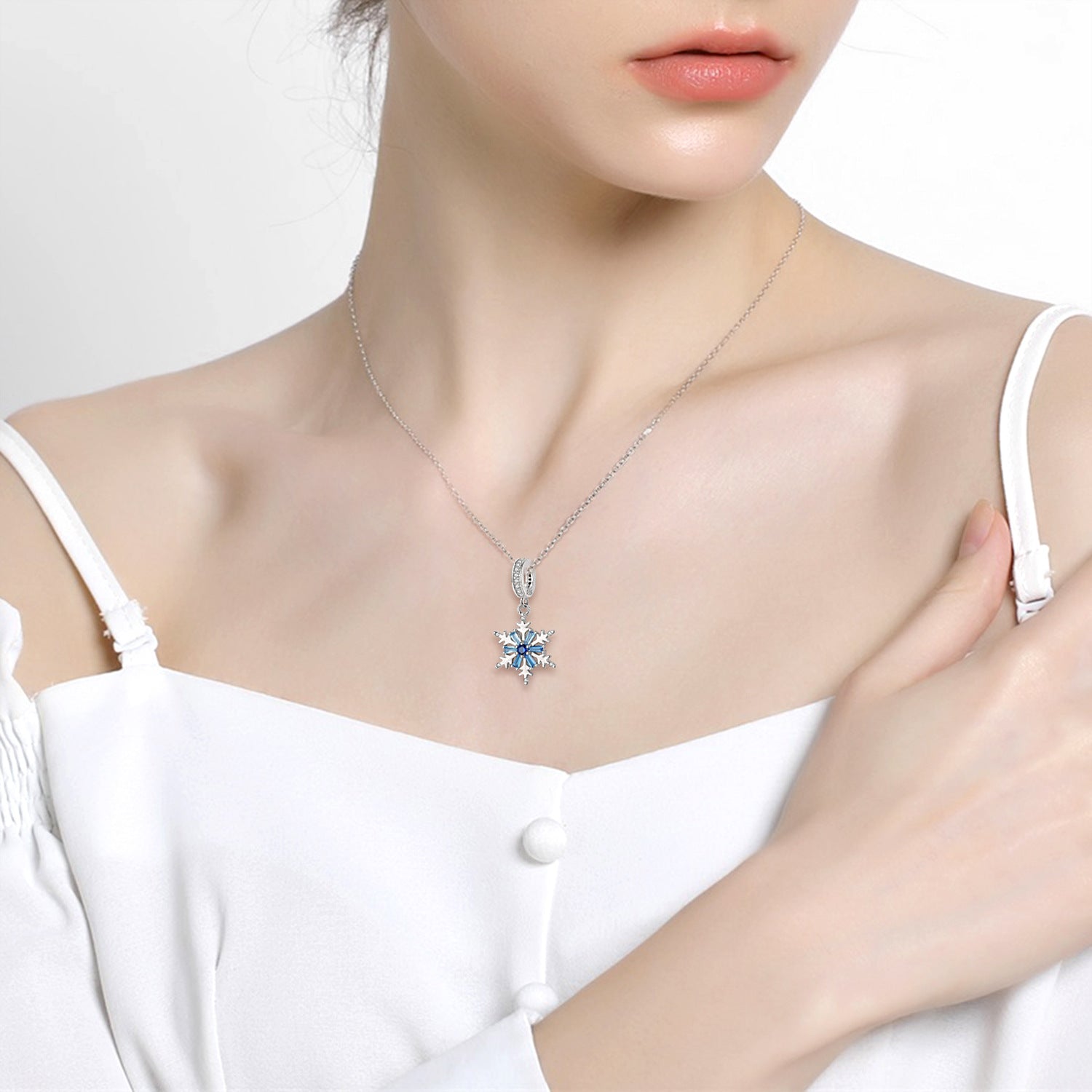 Blue Zircon Snowflake Silver Pendant