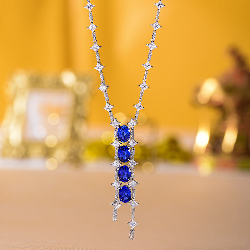 Oval Lab Created Sapphire Beading Tassle Silver Necklace