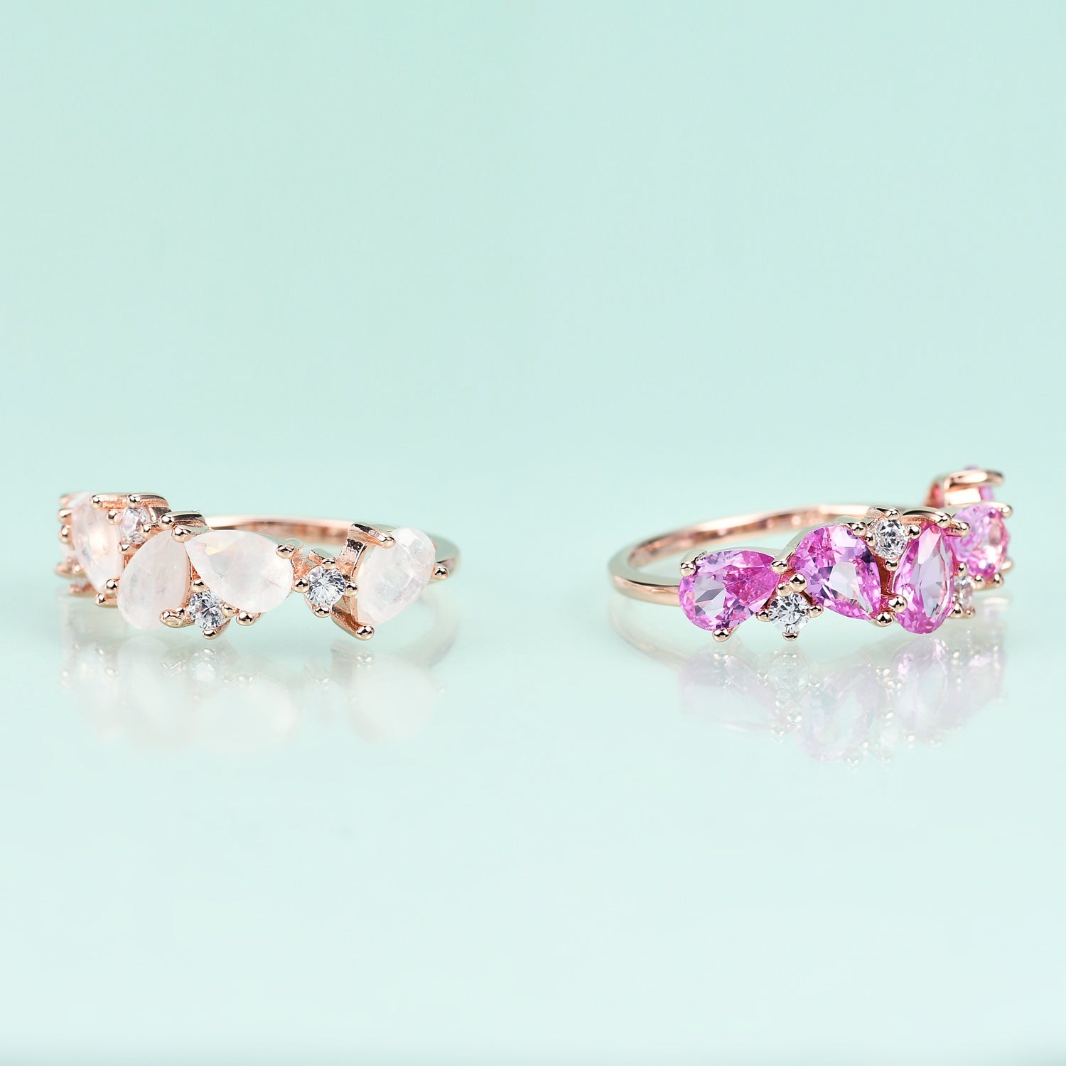 Row of Pear Shape Barbie Pink Corundum and Zircon Silver Ring