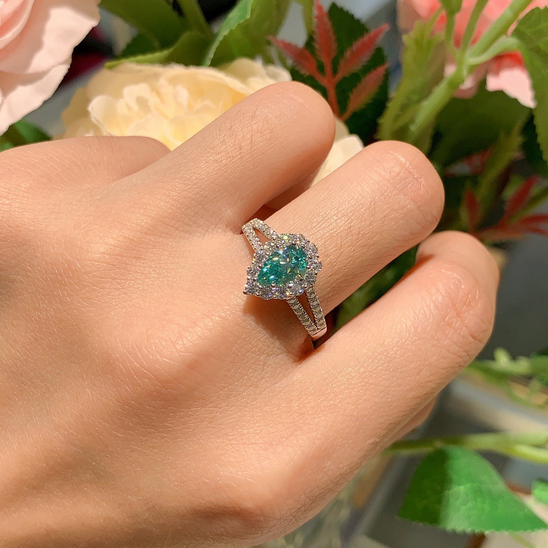 Soleste Halo 1.0 Carat Pear Shape Green Moissanite Silver Ring