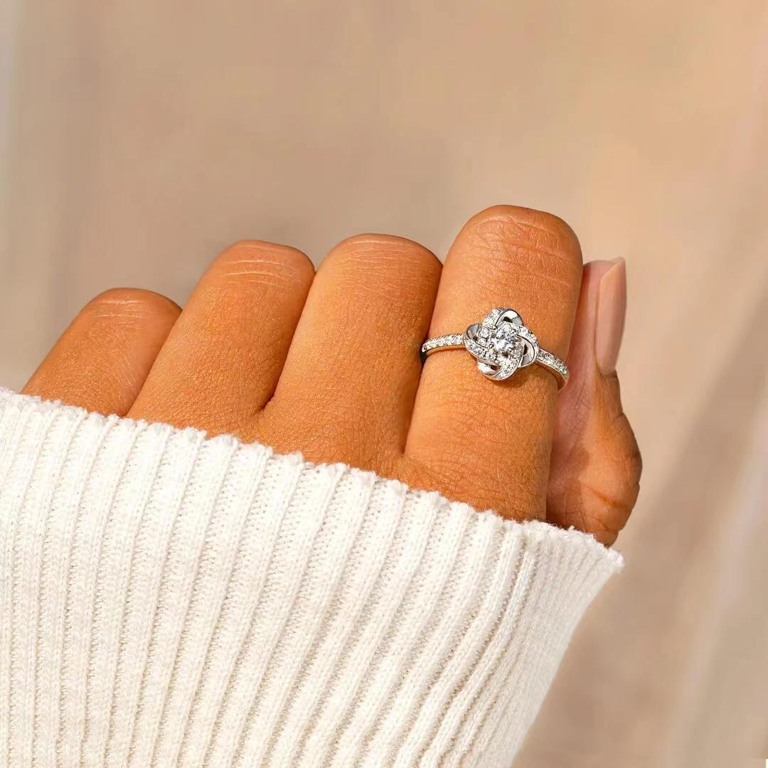 Round Zircon Four Leaf Windmill Opening Sterling Silver Ring