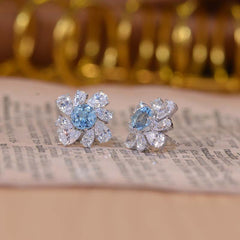 Annular Petals Round Natural Blue Topaz Studs