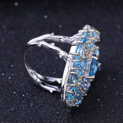 Bird In Jungle Natural Blue Topaz Oval Silver Ring