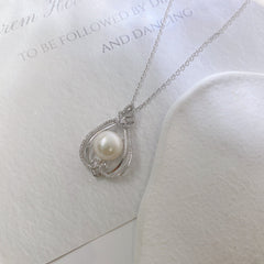 Hollow Pear Drop Shape with Round Natural Pearl Pendant Silver Necklace for Women